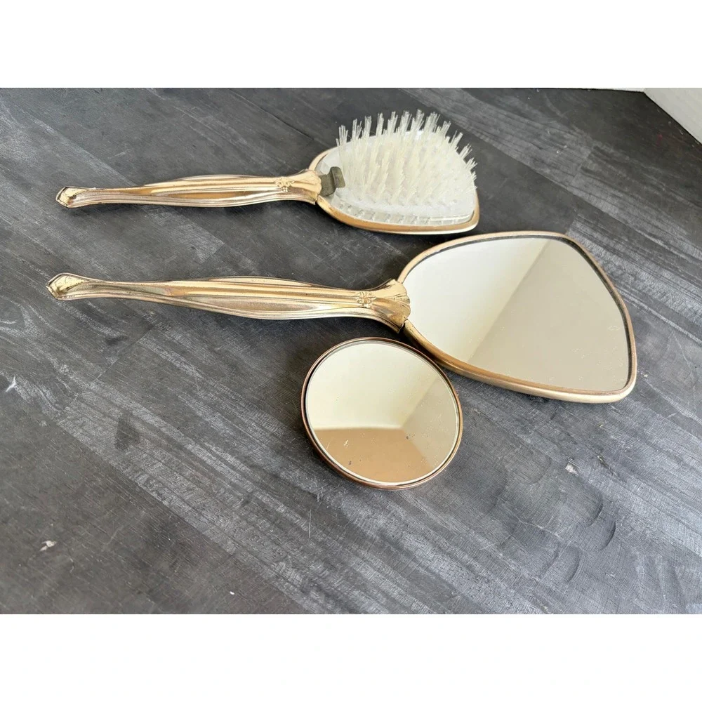 Vintage Gold Tone Floral Vanity Set Hand Mirror Hairbrush Compact 3 Piece Set